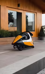 the motorcycle is parked in front of the building