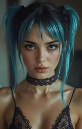 this model has bright blue hair and a halter style bra
