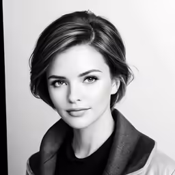 black and white photograph of a woman in a leather jacket