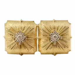 two vintage gold toned cufflinks with diamond details