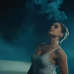 a young woman with smoke coming from her head