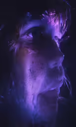 a woman looks off into the distance in space