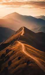 the sun sets on the hills and the road is curving