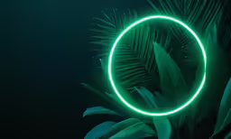a neon ring over plants with leaves
