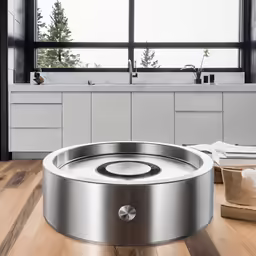 a kitchen floor with the lid up on it