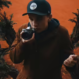 the person is taking a photo of the dirt