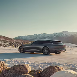 a gray volkswagen q3 sits in the snow