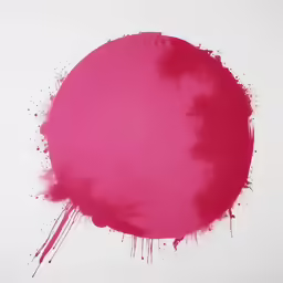 a circular piece of pink colored substance with splattered