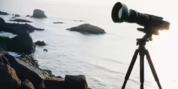 a photographer taking a picture of the water
