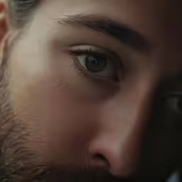a close up view of a mans face
