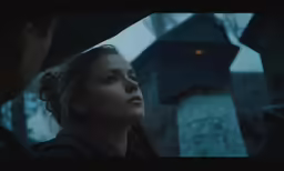 the girl is staring at the man