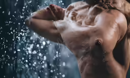 a man in the rain with his back to the camera