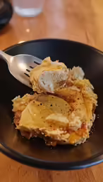 an omelet with a bite taken out of it