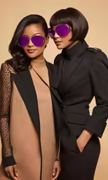 a couple of women that are wearing purple sunglasses