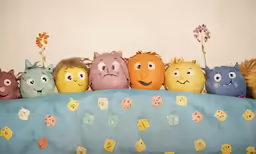a group of stuffed animals that are in a row