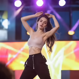 an image of a girl doing dance on stage