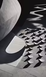 an architectural view of a concrete surface with abstractly designed patterns