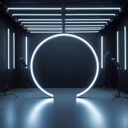 an empty space with lights around a bright white circular object