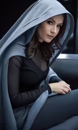 a woman is sitting in the back of a car