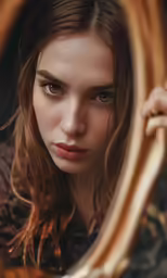 a close up of a person near a mirror