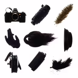 a variety of assorted hair and accessories placed on a white surface