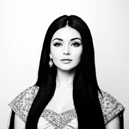 woman with long dark hair in black and white photo