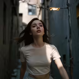 the woman is wearing a short, white shirt and a pair of shorts