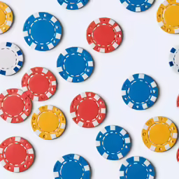 different colored chips arranged together on a white background