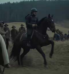 some men riding horses in the open land