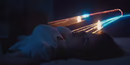 a woman in a white dress is lying down