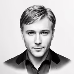 a man looking into the camera with an interesting look
