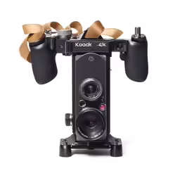 a kodak camera with lots of ribbons on it