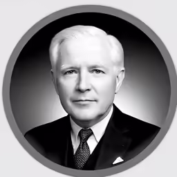 a close up photo of a man in a suit and tie