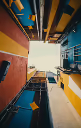 the back view of buildings that are painted in colors