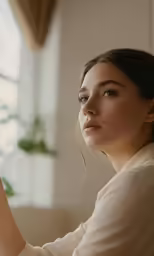 a girl looking away as she takes her photo