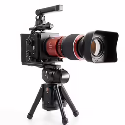 a camera mounted on top of a tripod