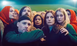 group of people in stadium crowd at event