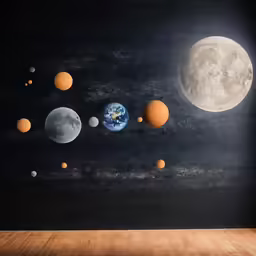 a wall has planets hanging in the dark
