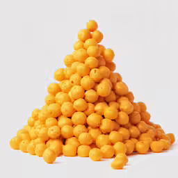 an odd shaped stack of small yellow balls