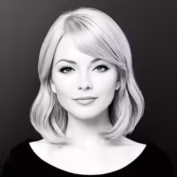 a woman with blonde hair is posing for the camera