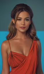 an asian female wearing an orange dress