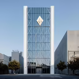 a tall building with a logo on the side of it