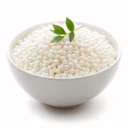 the bowl is filled with white beads