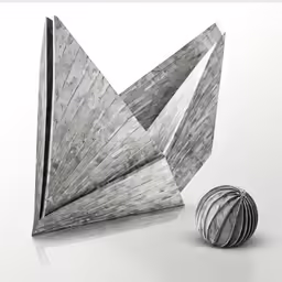 a folded paper boat is next to a ball
