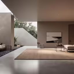 a room with grey walls and a large rug