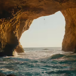water waves crash against the rocks and cliffs