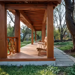 a wooden bench underneath a pergolated wood structure