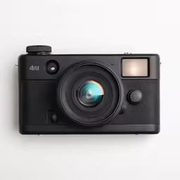 the top view of a camera with a lens