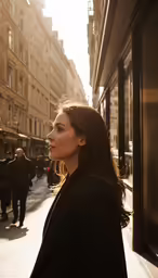 woman on the street with buildings in the background