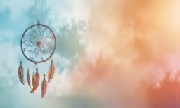 a wind catcher with feathers and a background